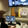 Monitors display scans created by MRI machine